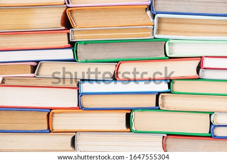 Many different books as background