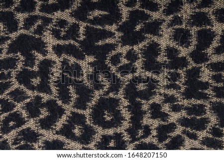 Close up leopard spot pattern texture.