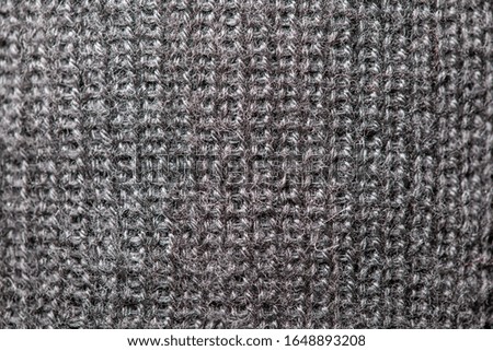 gray knitted fabric. texture. background