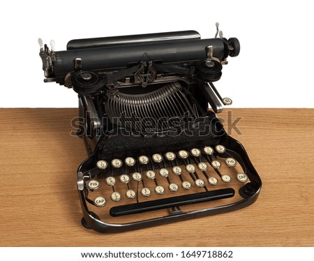 Antique Typewriter on oak desk. Exposed keys. 
