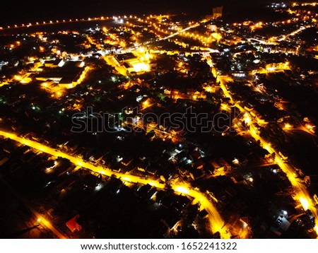 Drone view on small town Grocka at night. View from air on Grocka at night.