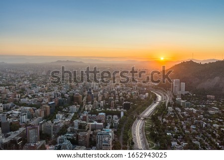 Panoramic view of Santiago city at sunset, from its tallest building