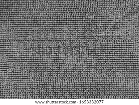 Blank generic seamless grey carpet rug texture background