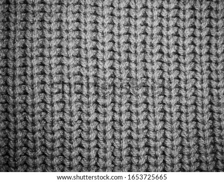 a gray knitted pattern background