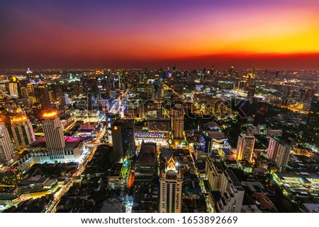 Bangkok city downtown and road traffic at sunset in Thailand , Cityscape