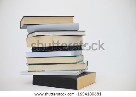 Stack of books on white background_