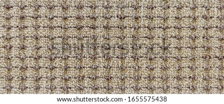Textured carpet background. Beautiful warm background for designer collages.