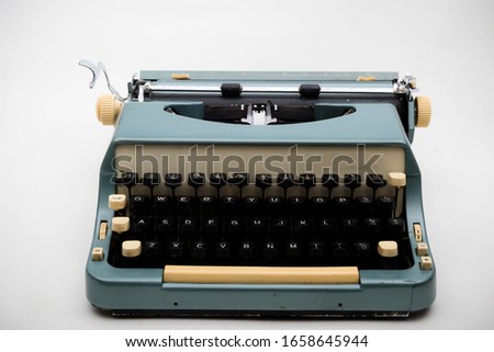 A typewriter isolated on a white background