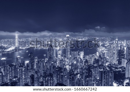 Panorama of Victoria Harbor of Hong Kong city at night
