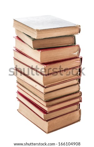 Pile of weathered old books isolated on white background