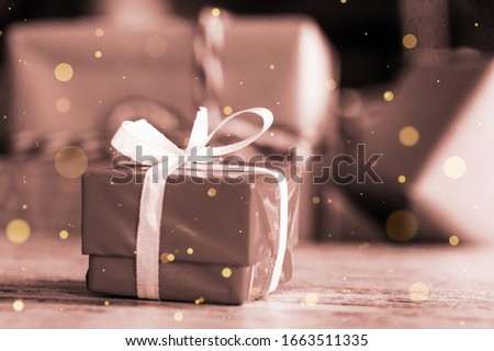 Beautiful gift boxes on a desk with bokeh