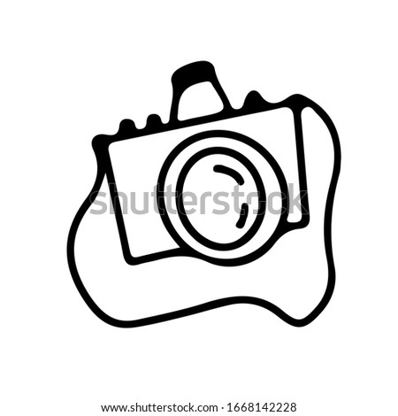 Doodle style camera on an isolated white background. Technique for travel, camping photos. Stock vector illustration