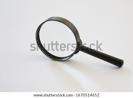 the magnifying glass isolated on white background