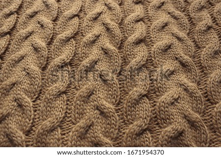 Close up beige knitting pattern