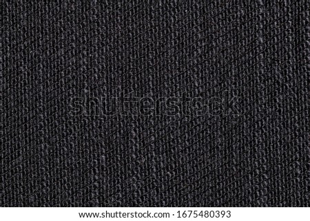 Photo of a piece of black tissue taken from up close.