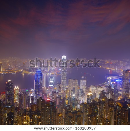 Hong Kong city skyline panorama at night with Victoria Harbor and skyscrapers