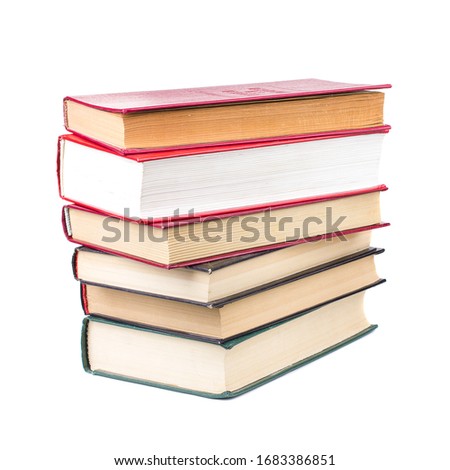 Stack of old vintage books on a white background
