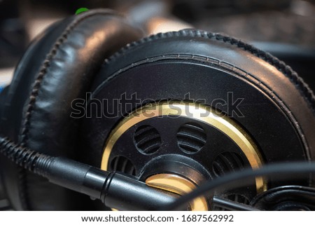 Extreme close up of black guitar headphones