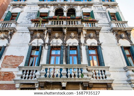 The beautiful age worn facade in Venice Italy