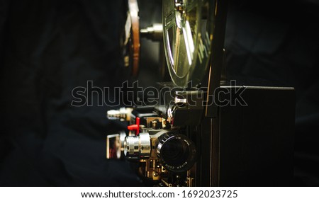 Vintage old fashioned projector, 8mm size,cinematography concept.