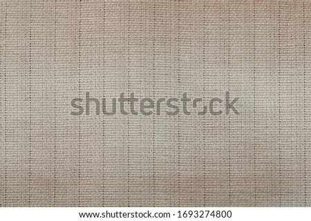 Brown textile texture flat background close up view