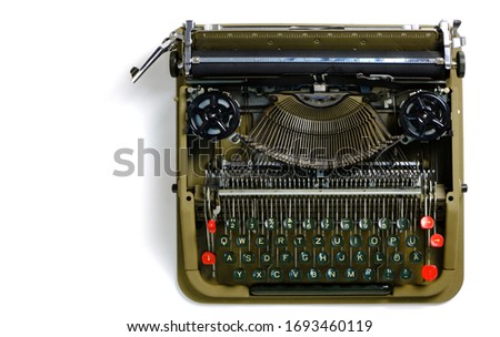 Old typewriter on a white background.Retro and vintage