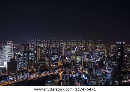 Night view at Osaka Japan, on the top of Umeda Sky Building downtown in Osaka