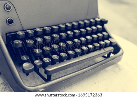 Detail of old vintage typewriter reminding past technology.