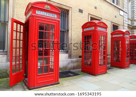 London telephone booth row. London landmarks - red phone booth.