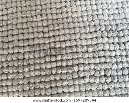 closeup of gray knit bubble texture   