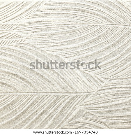 White ceramic tile  with leaves pattern for wall and floor decoration. Concrete stone surface background. Texture with floral ornament for interior design project.