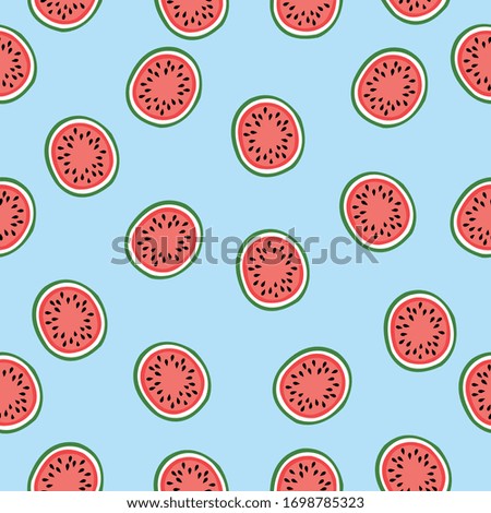 Cute watermelon slice seamless pattern on blue background