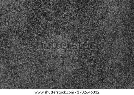 Dark black asphalt surface, background