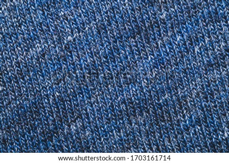 Fabric texture. woolen textile. knitted material close up. woven background