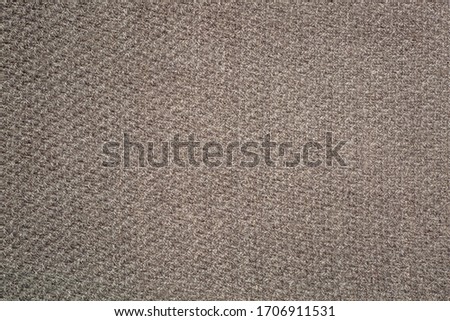The texture of the woolen cloth brown