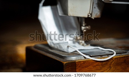 sewing machine sews medical masks