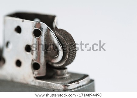 Old lighter isolated on white background. Metal style gasoline lighter .Copy space