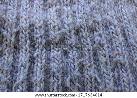 Close up beige knitting piece