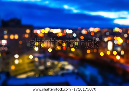 Unfocused blured multicolored background bokeh of city. Blurred bright light