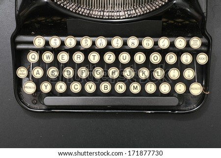 a typewriter in dramatic lighting.