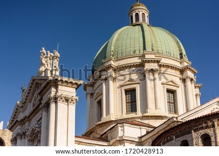 Detail with statues on the facade of the new cathedral, Brescia, Italy.
