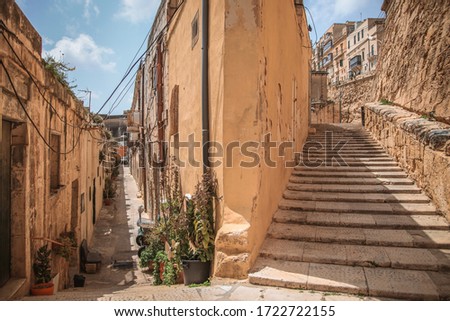 Old stairway through the city Valetta