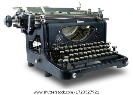 Ancient black typewriter isolated on white