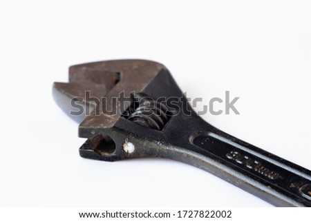 Hand tool, adjustable wrench isolated on white background.