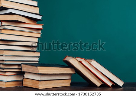 many stacks of educational books to prepare for exams in the university library