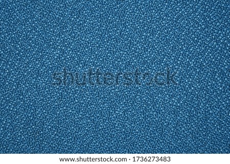 The texture and pattern of blue fabric for the background