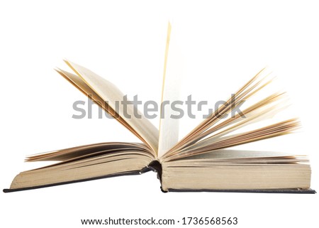 Open book with old yellow pages isolated on white background, side view                                          