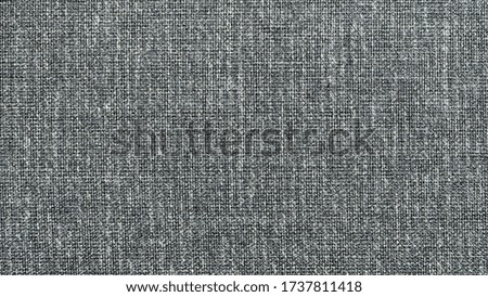 Background from natural linen fabric with a pronounced texture