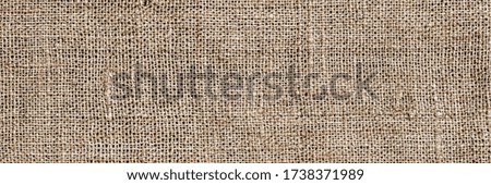 Natural  linen cloth, close up macro. Pure linen texture. Brown fabric frame,  banner