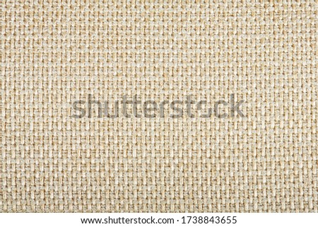 Real knitted fabric made of synthetic fibres or cotton textured background. furniture fabrics